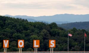 V-O-L-S letters with mountains in the background
