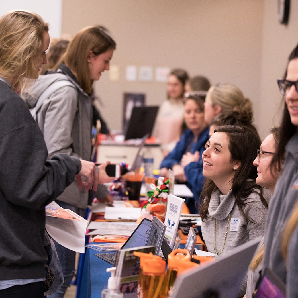 Student health center representatives tabling at an event