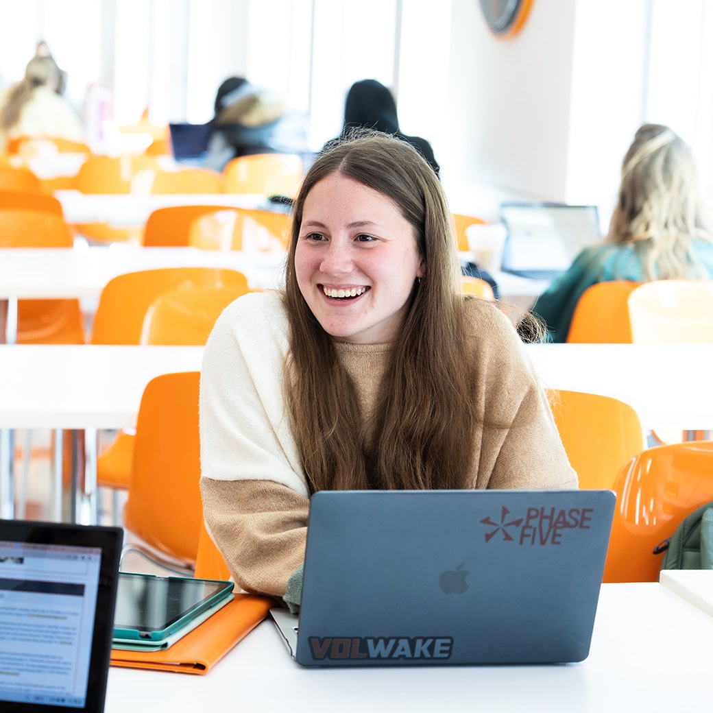 A woman on a laptop