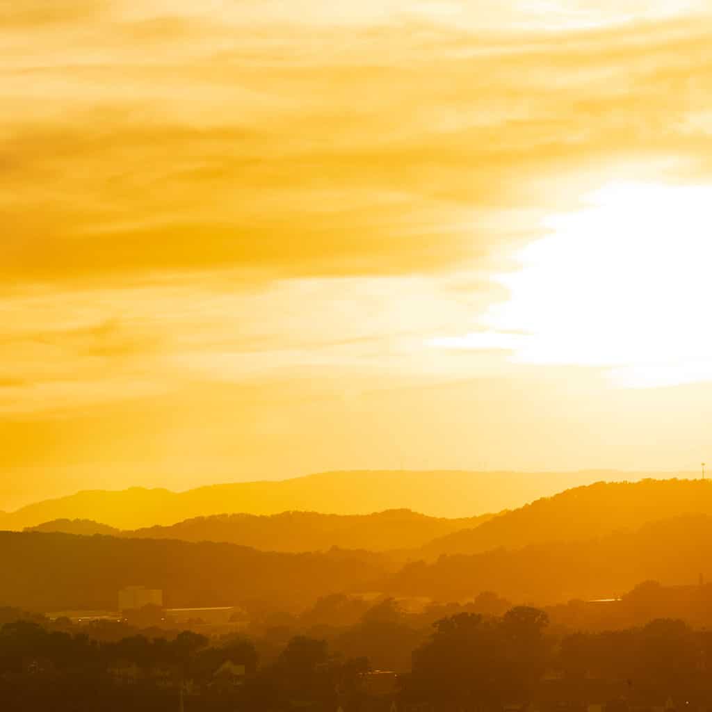 Orange sky over mountains