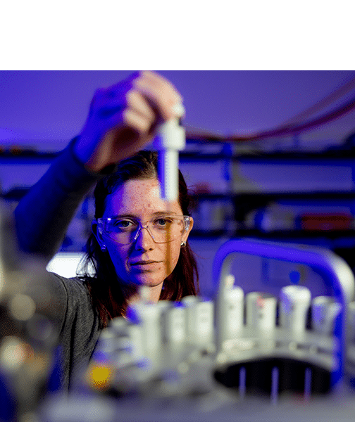 A student conducts research in the Spectrometer Lab