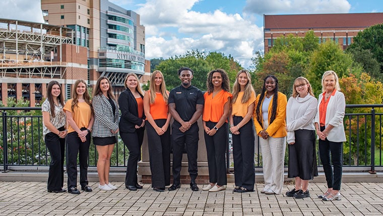 Students posing for a photo on Ped Walkway