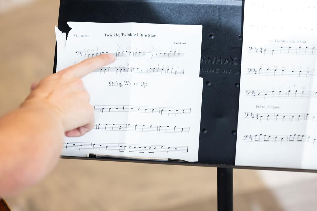 arthur-stephen-sheet-music-1200x800 Close up of a hand pointing to sheet music of Twinkle, Twinkle Little Star.