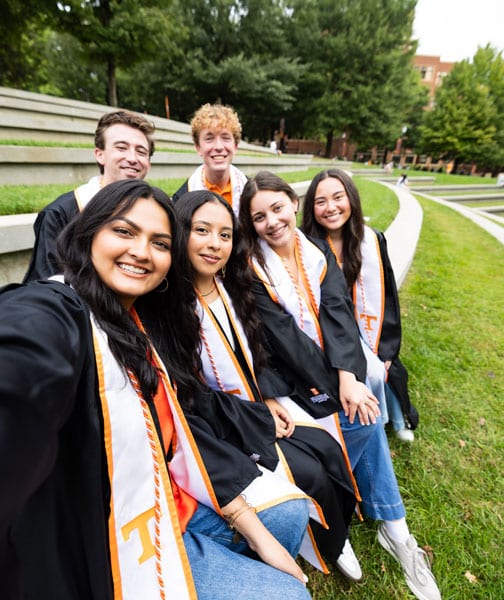 Graduates take a selfie in the Humanities Amphitheatre.