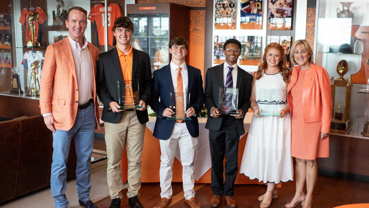 fy26-manning-scholars-1200x678 Peyton Manning and Chancellor Donde Plowman with the 2025 Peyton Manning Scholars.
