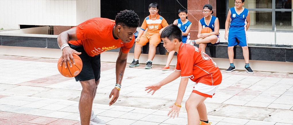 Admiral Schofield plays basketball during a VOLeaders trip in Vietnam