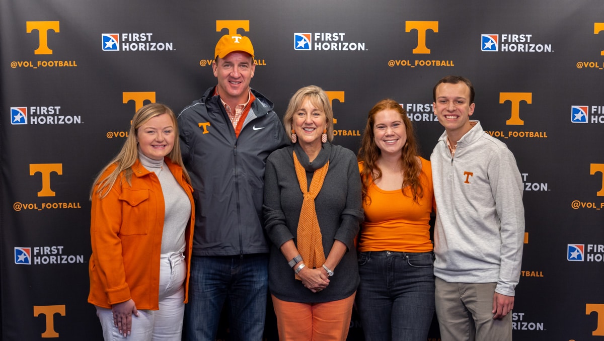Peyton Manning and Chancellor Donde Plowman with the Peyton Manning Scholars